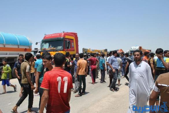 فض اعتصام لمتظاهرين قطعوا الطريق الدولي في الغراف بعد الاستجابة لمطالبهم بخصوص الكهرباء – تقرير مصور –