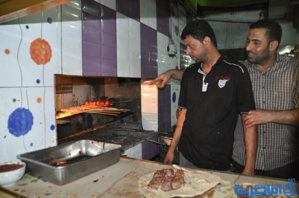 بالصور : ليالي سوق الشيوخ وشوارعها المضيئات