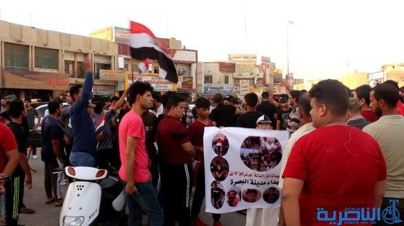 بالصور:العشرات في الناصرية يتظاهرون تضامنا مع اهالي البصرة