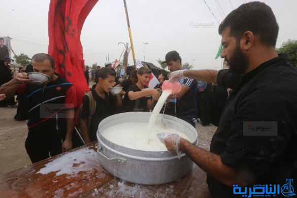 بالصور.. مواكب تدخل بـ&quot;منافسة محمومة&quot; لتقديم أشهى المأكولات لزائري الاربعينية