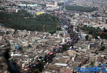 بالصور.. شوارع بغداد تكتظ بقاصدي &quot;باب الحوائج&quot;