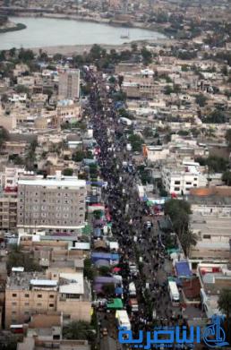 بالصور.. شوارع بغداد تكتظ بقاصدي &quot;باب الحوائج&quot;
