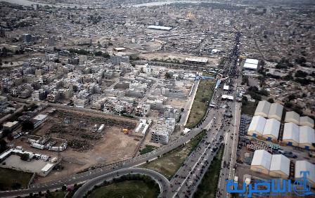 بالصور.. شوارع بغداد تكتظ بقاصدي &quot;باب الحوائج&quot;