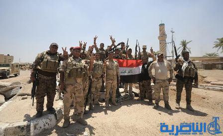  بالصور.. الكرمة تخلع رايات &quot;داعش&quot;