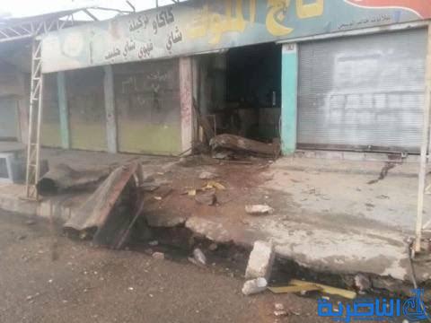  بالصور .. فرقة مقنعة تعالج آثار صواريخ الكلور وسط القيارة