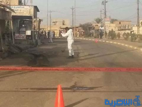  بالصور .. فرقة مقنعة تعالج آثار صواريخ الكلور وسط القيارة
