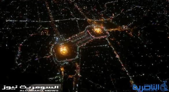  بالصور .. أنوار الإمام الحسين وأخيه العباس (ع) تدهش العقول من السماء