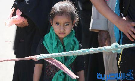  بالصور.. استمرار التوافد على &quot;باب الحوائج&quot;