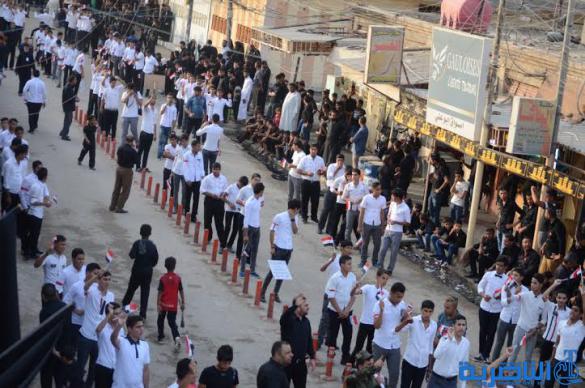  بالصور : مواكب الطلاب تجوب شوارع قلعة سكر في عزاء الحسين