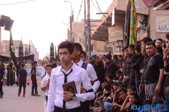  بالصور : مواكب الطلاب تجوب شوارع قلعة سكر في عزاء الحسين