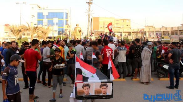 بالصور:العشرات في الناصرية يتظاهرون تضامنا مع اهالي البصرة
