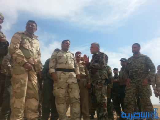 بالصور :الجيش والحشد الشعبي من اهالي ذي قار يطهرون جبال حمرين قي محافظة صلاح الدين