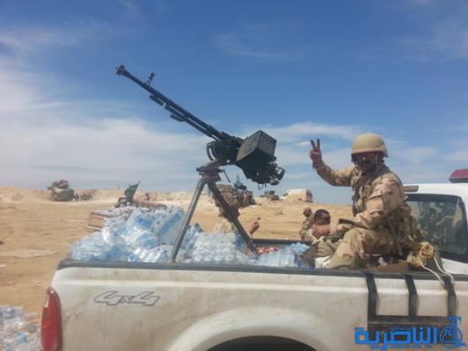 بالصور :الجيش والحشد الشعبي من اهالي ذي قار يطهرون جبال حمرين قي محافظة صلاح الدين