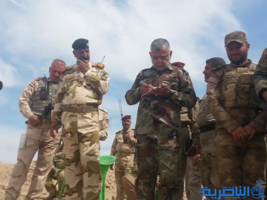 بالصور :الجيش والحشد الشعبي من اهالي ذي قار يطهرون جبال حمرين قي محافظة صلاح الدين
