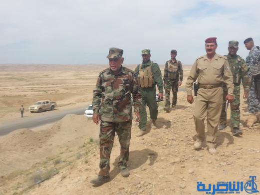 بالصور :الجيش والحشد الشعبي من اهالي ذي قار يطهرون جبال حمرين قي محافظة صلاح الدين