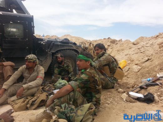 بالصور :الجيش والحشد الشعبي من اهالي ذي قار يطهرون جبال حمرين قي محافظة صلاح الدين