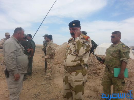 بالصور :الجيش والحشد الشعبي من اهالي ذي قار يطهرون جبال حمرين قي محافظة صلاح الدين