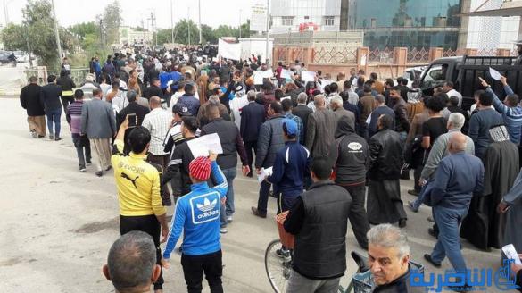 بالصور:العشرات يتظاهرون ضد الخصخصة في ذي قار