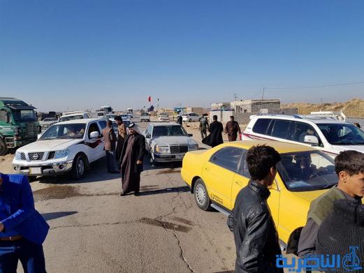 متظاهرون غاضبون يقطعون طريق (الجبايش - ناصرية ) للمطالبة بانجاز الممر الثاني منه - تقرير مصور-