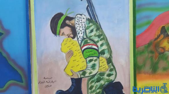 النشاط المدرسي في سوق الشيوخ يقيم معرضا للملصق السياسي