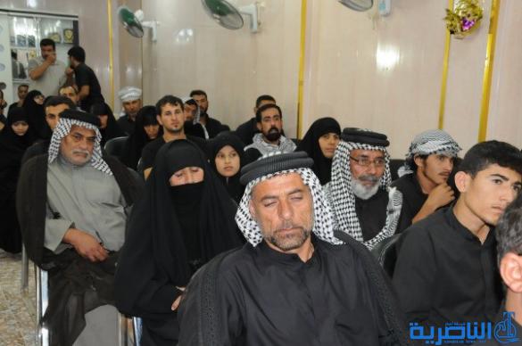 شرطة ذي قار تكرم 57 عائلة من عوائل شهداء الحشد الشعبي - تقرير مصور -