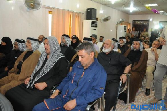 شرطة ذي قار تكرم 57 عائلة من عوائل شهداء الحشد الشعبي - تقرير مصور -