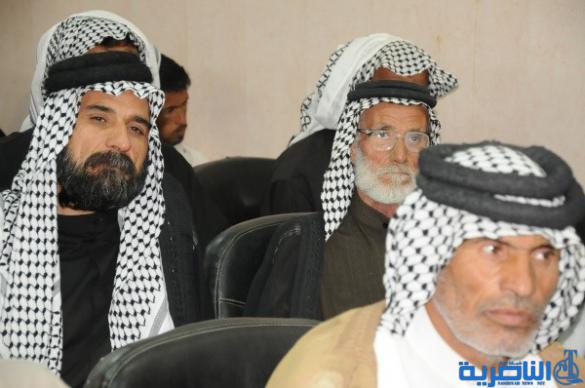 شرطة ذي قار تكرم 57 عائلة من عوائل شهداء الحشد الشعبي - تقرير مصور -