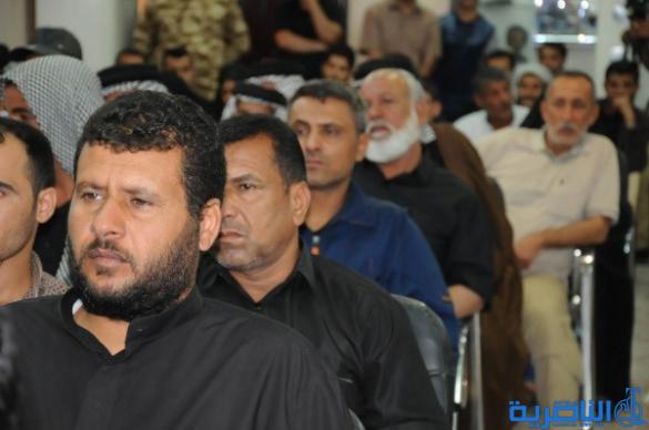 شرطة ذي قار تكرم 57 عائلة من عوائل شهداء الحشد الشعبي - تقرير مصور -