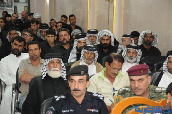 شرطة ذي قار تكرم 57 عائلة من عوائل شهداء الحشد الشعبي - تقرير مصور -