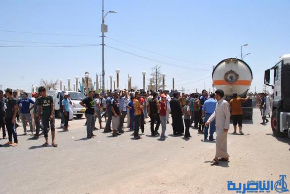 فض اعتصام لمتظاهرين قطعوا الطريق الدولي في الغراف بعد الاستجابة لمطالبهم بخصوص الكهرباء – تقرير مصور –