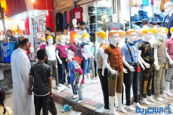 بالصور : اسواق الناصرية لا تنام استعدادا لعيد الفطر المبارك 