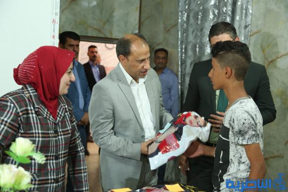 محافظ ذي قار يوزع هدايا وكسوة العيد على الايتام - تقرير مصور - 