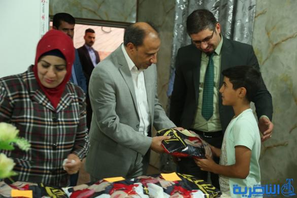 محافظ ذي قار يوزع هدايا وكسوة العيد على الايتام - تقرير مصور - 