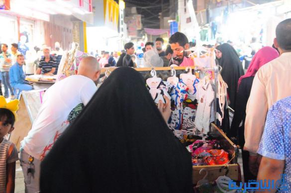 بالصور : اسواق الناصرية لا تنام استعدادا لعيد الفطر المبارك 