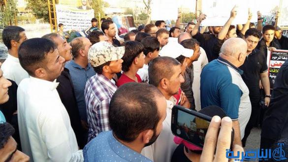  ذوو ضحايا الاطلاقات النارية ينظمون وقفة احتجاجية في الشطرة - تقرير مصور -