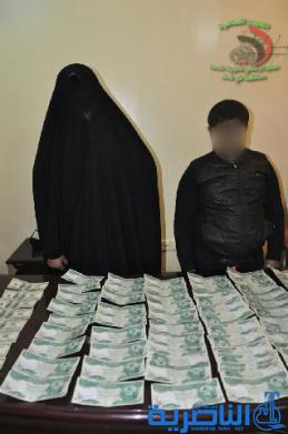 بالصور : اعتقال سيدة بصرية تروج عملة مزورة في الشطرة
