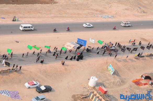 بعدسة شبكة اخبار الناصرية:صور جوية لجموع الزوار على درب الحسين