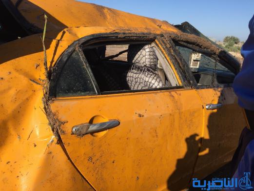  بالصور : انقلاب مركبة شمال الناصرية والضحايا من كبار السن