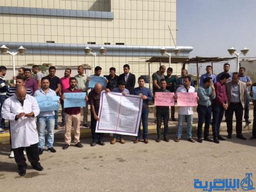  وقفة احتجاجية لكوادر التخدير في ذي قار للمطالبة بتوزيع الاراضي السكنية - تقرير مصور -