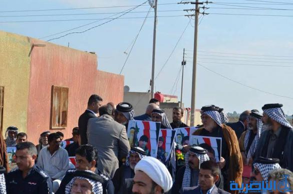 محافظ ذي قار يشارك في تكريم اسر شهداء الحشد الشعبي والقوات الامنية في الرفاعي - تقرير مصور -