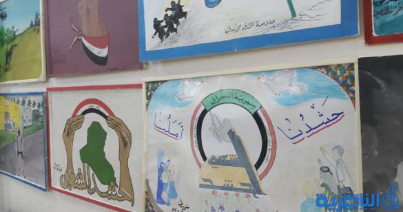 النشاط المدرسي في سوق الشيوخ يقيم معرضا للملصق السياسي