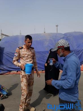 بالصور:موكب حسيني لقاعدة الامام علي الجوية خدمة لزوار الاربعين 