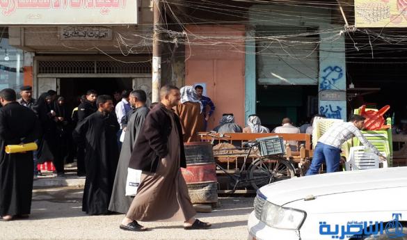 امراة تضرب موظفا في ضريبة الشطرة وزملائه يضربون حتى توفير الحماية لهم