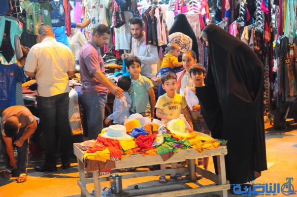 بالصور : اسواق الناصرية لا تنام استعدادا لعيد الفطر المبارك 