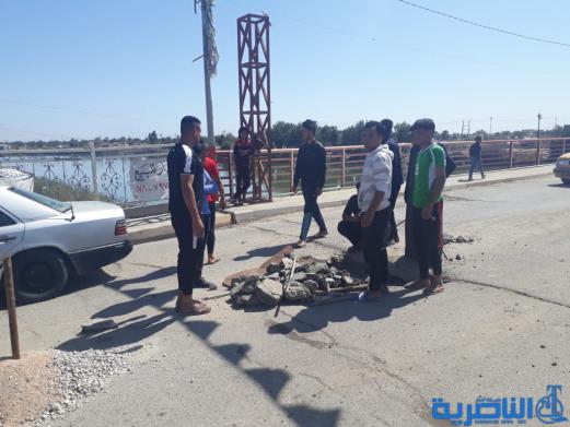إصلاح جسر في ناحية العكيكة من قبل المواطنين -تقرير مصور-