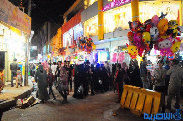 بالصور : اسواق الناصرية لا تنام استعدادا لعيد الفطر المبارك 