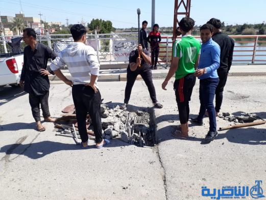 إصلاح جسر في ناحية العكيكة من قبل المواطنين -تقرير مصور-