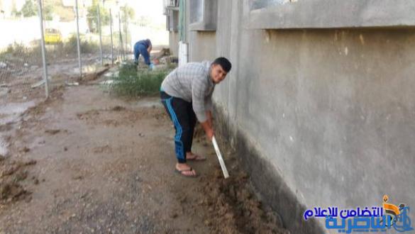 مجموعة من المعلمين يختارون أيام العطلة لتنفيذ أعمال تطوعية في مدرسة التضامن السادسة للأيتام