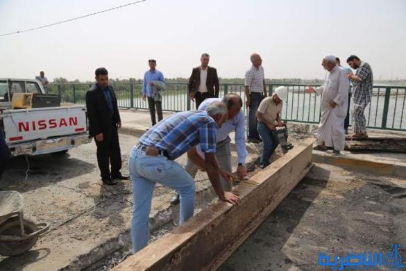 بالصور : محافظ ذي قار يعلن عن قرب الانتهاء من اعمال تاهيل جسر المرور السريع الكونكريتي ، ويوجه باكساء وتاهيل مقتربات الجسر