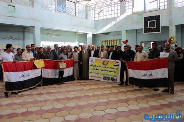 طلبة التضامن في الناصرية ينظمون وقفة تضامنيه مع الحشد الشعبي